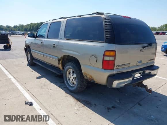 2002 Chevrolet Suburban Z71 z VIN 3GNFK16Z72G205420, wystawiony jako IAAI lot #43216603 z przebiegiem 191 520 mil mil oraz . Historia ofert i sprzedaży dostępna na DreamBid. Obrazek 3.