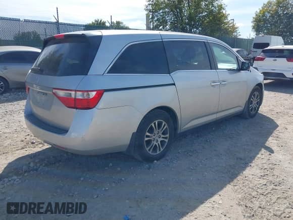 2012 Honda Odyssey EX с VIN 5FNRL5H49CB059301, выставлен на аукционе IAAI как лот 43372796 с пробегом 131 739 миль миль и . История ставок и продаж доступна на DreamBid. Изображение 4.