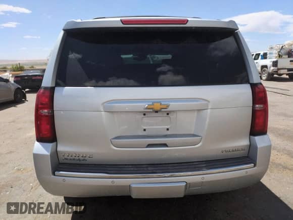 2019 Chevrolet Tahoe Premier с VIN 1GNSKCKC3KR301654, выставлен на аукционе Copart как лот 55701745 с пробегом 75 730 миль миль и Списание • Salvage title. История ставок и продаж доступна на DreamBid. Изображение 6.