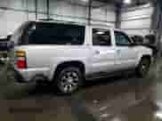 2005 Chevrolet Suburban LS z VIN 3GNFK16Z35G203233, wystawiony jako Copart lot #56381734 z przebiegiem 234 378 mil mil oraz Szkoda całkowita • Salvage title. Historia ofert i sprzedaży dostępna na DreamBid. Obrazek 3.