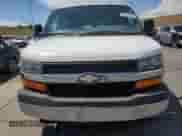 2015 Chevrolet Express Passenger LT с VIN 1GAZG1FG6F1217514, выставлен на аукционе Copart как лот 64759505 с пробегом 270 681 миль миль и Чистый • Clean title. История ставок и продаж доступна на DreamBid. Изображение 5.