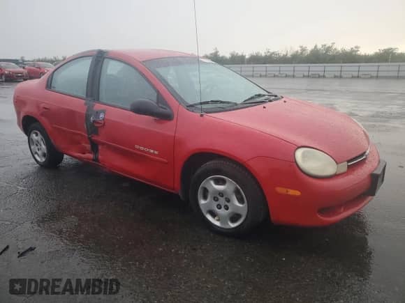 2000 Dodge Neon Highline with VIN 1B3ES46C0YD713835, listed as a Copart auction lot 77951064 with 96,173 mi miles and Salvage title. Bid and sale history available at DreamBid. Image 4.