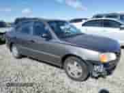 2002 Hyundai Accent GL z VIN KMHCG45C22U336484, wystawiony jako Copart lot #47776665 z przebiegiem 184 346 mil mil oraz Szkoda całkowita • Salvage title. Historia ofert i sprzedaży dostępna na DreamBid. Obrazek 4.