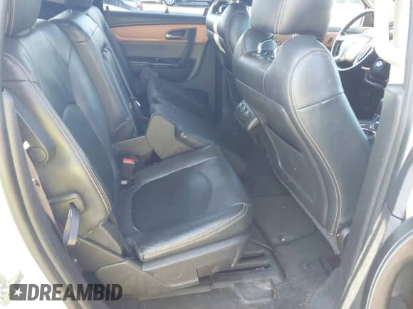2014 Chevrolet Traverse LT z VIN 1GNKRGKDXEJ351403, wystawiony jako IAAI lot #43478003 z przebiegiem 128 967 mil mil oraz . Historia ofert i sprzedaży dostępna na DreamBid. Obrazek 8.