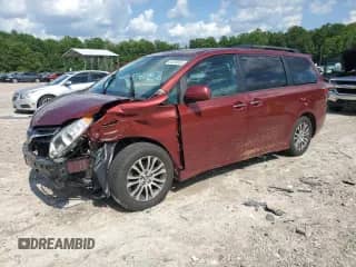2018 Toyota Sienna XLE with VIN 5TDYZ3DCXJS941257, listed as a Copart auction lot 64326695 with 124,760 mi miles and Salvage title. Bid and sale history available at DreamBid. Image 1.
