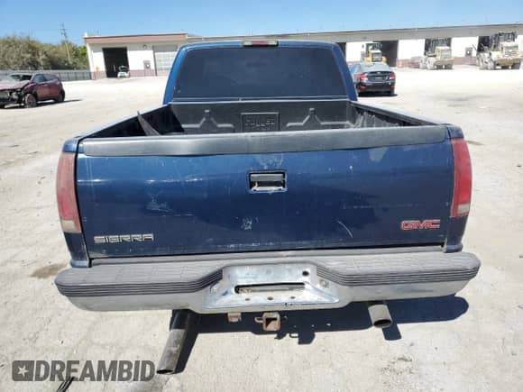 1998 GMC Sierra 1500 z VIN 1GTEC19M8WE556142, wystawiony jako Copart lot #74216184 z przebiegiem 306 795 mil mil oraz Czysty tytuł • Clean title. Historia ofert i sprzedaży dostępna na DreamBid. Obrazek 6.