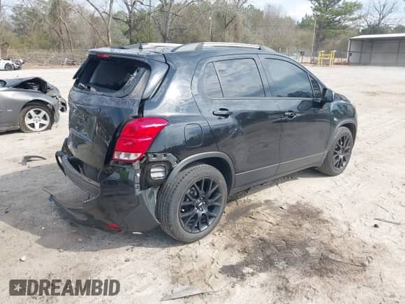 2022 Chevrolet Trax LT with VIN KL7CJLSM7NB513928, listed as a IAAI auction lot 41694269 with 40,639 mi miles and . Bid and sale history available at DreamBid. Image 4.