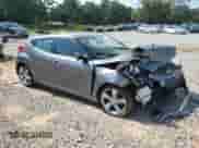 2012 Hyundai Veloster w/Black Int z VIN KMHTC6AD7CU028864, wystawiony jako Copart lot #66377895 z przebiegiem 130 440 mil mil oraz Szkoda całkowita • Salvage title. Historia ofert i sprzedaży dostępna na DreamBid. Obrazek 4.