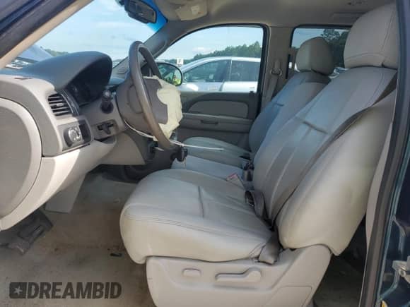 2007 Chevrolet Tahoe LS with VIN 1GNEC13J37R145053, listed as a Copart auction lot 64304475 with 169,138 mi miles and Salvage title. Bid and sale history available at DreamBid. Image 7.