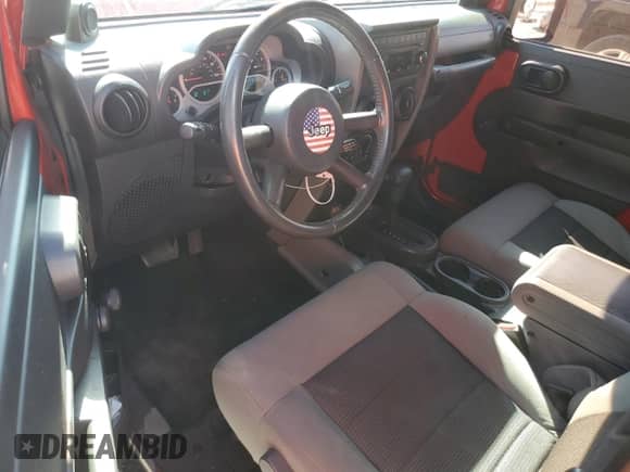 2010 Jeep Wrangler Sport with VIN 1J4AA2D13AL230819, listed as a Copart auction lot 81859015 with 104,290 mi miles and Salvage title. Bid and sale history available at DreamBid. Image 8.