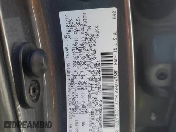 2014 Toyota Tacoma z VIN 5TFLU4EN2EX095012, wystawiony jako Copart lot #82272415 z przebiegiem 209 545 mil mil oraz Szkoda całkowita • Salvage title. Historia ofert i sprzedaży dostępna na DreamBid. Obrazek 13.