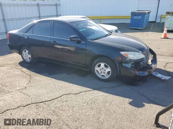 2002 Toyota Camry XLE with VIN 4T1BF30K32U006442, listed as a Copart auction lot 80882015 with 151,964 mi miles and Salvage title. Bid and sale history available at DreamBid. Image 4.