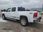 2010 GMC Sierra 1500 SLT z VIN 3GTRKWE29AG160857, wystawiony jako Copart lot #86632774 z przebiegiem 135 414 mil mil oraz Szkoda całkowita • Salvage title. Historia ofert i sprzedaży dostępna na DreamBid. Obrazek 2.