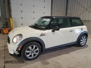 2009 MINI Hardtop S with VIN WMWMF73509TW83147, listed as a Copart auction lot 81900235 with 12,429 mi miles and Salvage title. Bid and sale history available at DreamBid. Image 1.