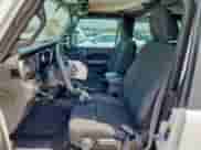 2022 Jeep Wrangler Willys с VIN 1C4GJXANXNW129964, выставлен на аукционе Copart как лот 71792395 с пробегом 24 831 миль миль и Чистый • Clean title. История ставок и продаж доступна на DreamBid. Изображение 7.