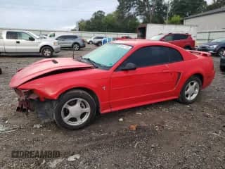 2002 Ford Mustang Standard z VIN 1FAFP40462F120939, wystawiony jako Copart lot #81977115 z przebiegiem 234 988 mil mil oraz Szkoda całkowita • Salvage title. Historia ofert i sprzedaży dostępna na DreamBid. Obrazek 1.