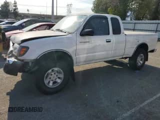 2000 Toyota Tacoma PreRunner z VIN 5TESN92N3YZ696470, wystawiony jako Copart lot #65285025 z przebiegiem 339 005 mil mil oraz Szkoda całkowita • Salvage title. Historia ofert i sprzedaży dostępna na DreamBid. Obrazek 1.