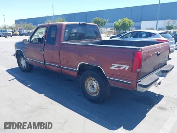 1998 Chevrolet Silverado 1500 z VIN 2GCEK19R9W1114583, wystawiony jako IAAI lot #42708464 z przebiegiem 176 412 mil mil oraz . Historia ofert i sprzedaży dostępna na DreamBid. Obrazek 3.