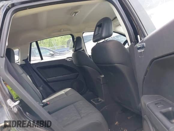 2008 Dodge Caliber SE with VIN 1B3HB28B58D753818, listed as a IAAI auction lot 39373913 with 172,972 mi miles and . Bid and sale history available at DreamBid. Image 8.