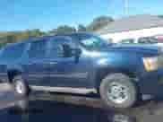 2007 Chevrolet Suburban LS z VIN 3GNGK26K07G281954, wystawiony jako IAAI lot #43444651 z przebiegiem 171 677 mil mil oraz . Historia ofert i sprzedaży dostępna na DreamBid. Obrazek 13.