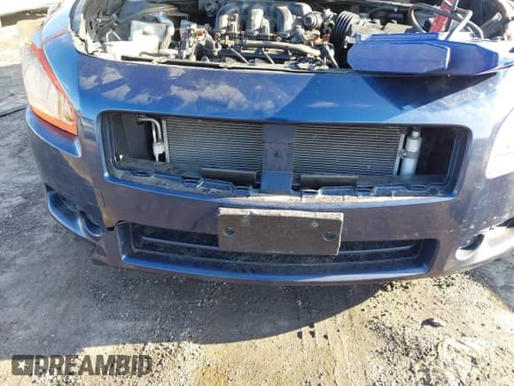 2014 Nissan Maxima SV z VIN 1N4AA5AP4EC488147, wystawiony jako IAAI lot #41165771 z przebiegiem 44 113 mil mil oraz . Historia ofert i sprzedaży dostępna na DreamBid. Obrazek 13.