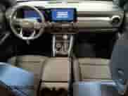 2025 Chevrolet Colorado 4WD LT с VIN 1GCPTCEK4S1220756, выставлен на аукционе Copart как лот 81070505 с пробегом 2 001 миль миль и Списание • Salvage title. История ставок и продаж доступна на DreamBid. Изображение 8.