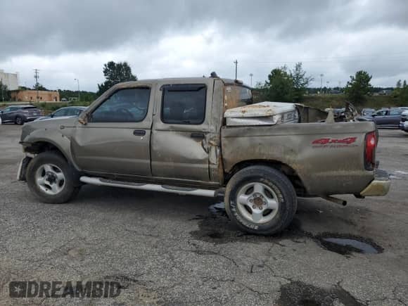 2001 Nissan Frontier SE with VIN 1N6ED27Y41C312269, listed as a Copart auction lot 69503465 with Not provided miles and Salvage title. Bid and sale history available at DreamBid. Image 2.