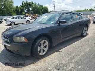 2014 Dodge Charger SE with VIN 2C3CDXBG9EH177433, listed as a Copart auction lot 60559955 with 111,129 mi miles and Salvage title. Bid and sale history available at DreamBid. Image 1.