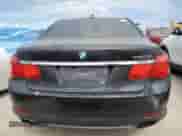 2011 BMW 7 Series 740i with VIN WBAKA4C51BC612517, listed as a Copart auction lot 76987474 with Not provided miles and Salvage title. Bid and sale history available at DreamBid. Image 6.