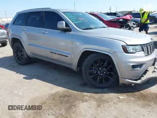 2018 Jeep Grand Cherokee Altitude with VIN 1C4RJEAG7JC181921, listed as a IAAI auction lot 43208554 with 157,255 mi miles and . Bid and sale history available at DreamBid. Image 1.