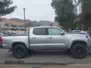 2019 Toyota Tacoma SR5 with VIN 3TMAZ5CN9KM108003, listed as a IAAI auction lot 43249340 with 80,485 mi miles and . Bid and sale history available at DreamBid. Image 14.