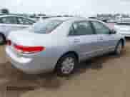 2003 Honda Accord LX with VIN JHMCM56333C031860, listed as a IAAI auction lot 43449115 with 180,565 mi miles and . Bid and sale history available at DreamBid. Image 4.