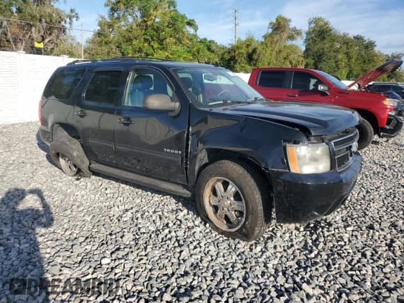 2011 Chevrolet Tahoe LS с VIN 1GNSCAE0XBR223506, выставлен на аукционе Copart как лот 87433045 с пробегом 156 433 миль миль и Списание • Salvage title. История ставок и продаж доступна на DreamBid. Изображение 4.