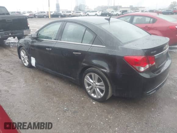 2012 Chevrolet Cruze LTZ with VIN 1G1PH5SCXC7259286, listed as a IAAI auction lot 43283961 with 128,591 mi miles and . Bid and sale history available at DreamBid. Image 3.