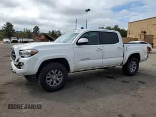 2017 Toyota Tacoma SR5 with VIN 5TFAZ5CN9HX047898, listed as a Copart auction lot 82317075 with 123,666 mi miles and Salvage title. Bid and sale history available at DreamBid. Image 1.