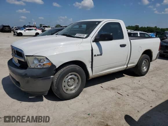 2010 Dodge 1500 ST with VIN 3D7JB1EK6AG155797, listed as a Copart auction lot 61848235 with 123,263 mi miles and Salvage title. Bid and sale history available at DreamBid. Image 1.