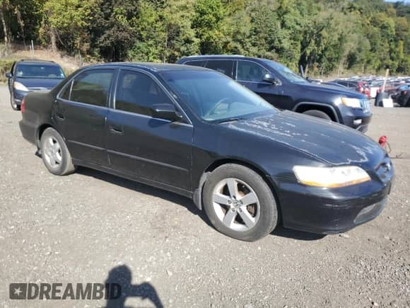1998 Honda Accord EX with VIN 1HGCG1653WA033449, listed as a Copart auction lot 84936845 with 268,201 mi miles and Salvage title. Bid and sale history available at DreamBid. Image 4.