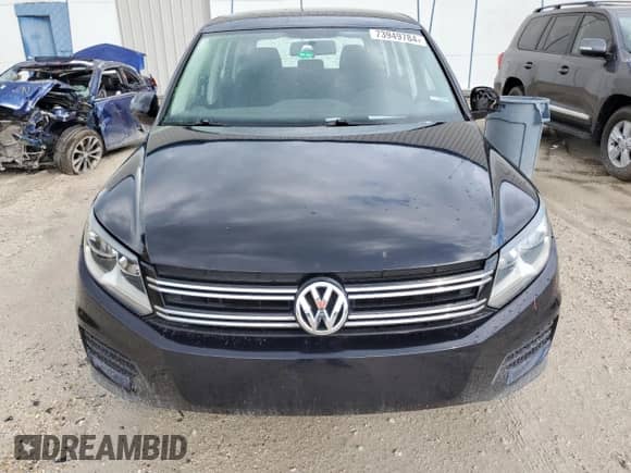 2014 Volkswagen Tiguan with VIN WVGCV3AX4EW526613, listed as a Copart auction lot 73949784 with 83,421 mi miles and Salvage title. Bid and sale history available at DreamBid. Image 5.