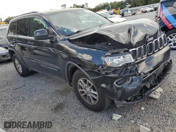 2018 Jeep Grand Cherokee Laredo z VIN 1C4RJEAGXJC399979, wystawiony jako Copart lot #66686455 z przebiegiem 108 942 mil mil oraz Szkoda całkowita • Salvage title. Historia ofert i sprzedaży dostępna na DreamBid. Obrazek 4.