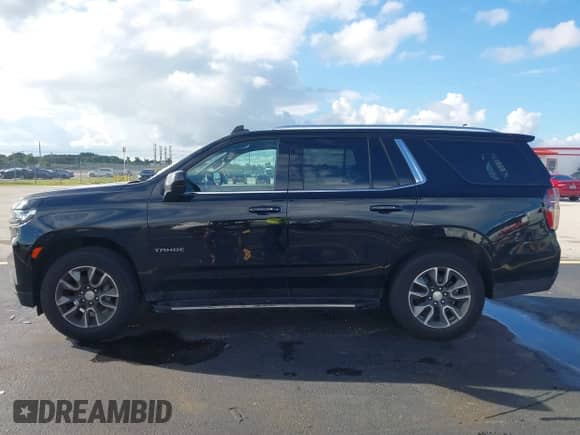 2021 Chevrolet Tahoe LT z VIN 1GNSCNKD2MR443255, wystawiony jako IAAI lot #43364345 z przebiegiem 133 418 mil mil oraz . Historia ofert i sprzedaży dostępna na DreamBid. Obrazek 15.