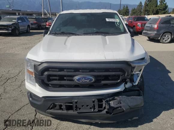 2022 Ford F-150 XL with VIN 1FTEX1CP3NKE58532, listed as a Copart auction lot 70737435 with 95,811 mi miles and Salvage title. Bid and sale history available at DreamBid. Image 5.