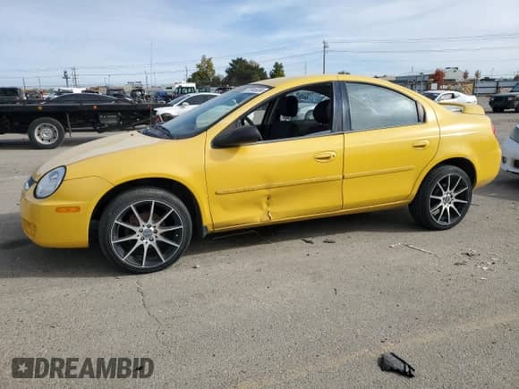 2004 Dodge Neon SXT with VIN 1B3ES56CX4D542379, listed as a Copart auction lot 77046934 with 133,446 mi miles and Clean title. Bid and sale history available at DreamBid. Image 1.