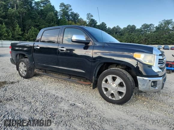 2016 Toyota Tundra Platinum with VIN 5TFGW5F16GX208427, listed as a Copart auction lot 71295365 with 150,184 mi miles and Salvage title. Bid and sale history available at DreamBid. Image 4.