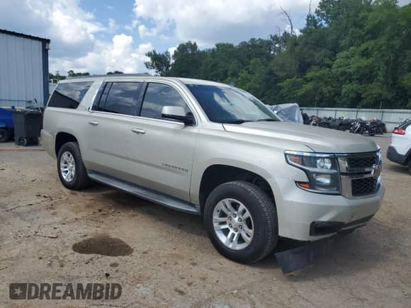 2015 Chevrolet Suburban LT с VIN 1GNSCJKC9FR279344, выставлен на аукционе Copart как лот 65216185 с пробегом 293 026 миль миль и Списание • Salvage title. История ставок и продаж доступна на DreamBid. Изображение 4.