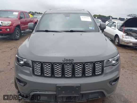 2021 Jeep Grand Cherokee Laredo X with VIN 1C4RJFAG4MC690570, listed as a IAAI auction lot 42708592 with 64,547 mi miles and . Bid and sale history available at DreamBid. Image 13.