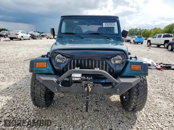 1999 Jeep Wrangler Sport with VIN 1J4FY19S7XP435204, listed as a Copart auction lot 83820835 with 263,738 mi miles and Clean title. Bid and sale history available at DreamBid. Image 5.