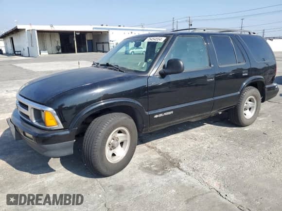 1996 Chevrolet Blazer z VIN 1GNCS13W3T2201288, wystawiony jako Copart lot #75454554 z przebiegiem 206 717 mil mil oraz Szkoda całkowita • Salvage title. Historia ofert i sprzedaży dostępna na DreamBid. Obrazek 1.