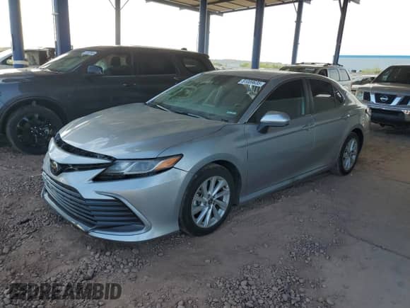 2022 Toyota Camry LE с VIN 4T1C11AK0NU700595, выставлен на аукционе Copart как лот 81089635 с пробегом 20 430 миль миль и Списание • Salvage title. История ставок и продаж доступна на DreamBid. Изображение 1.
