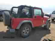 2003 Jeep Wrangler X z VIN 1J4FA39S33P308881, wystawiony jako Copart lot #69323655 z przebiegiem 264 257 mil mil oraz Szkoda całkowita • Salvage title. Historia ofert i sprzedaży dostępna na DreamBid. Obrazek 3.