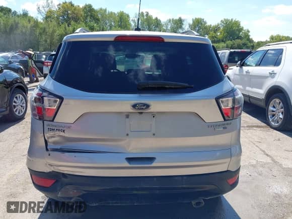2017 Ford Escape Titanium z VIN 1FMCU9J9XHUC08079, wystawiony jako IAAI lot #43333080 z przebiegiem 169 596 mil mil oraz . Historia ofert i sprzedaży dostępna na DreamBid. Obrazek 16.